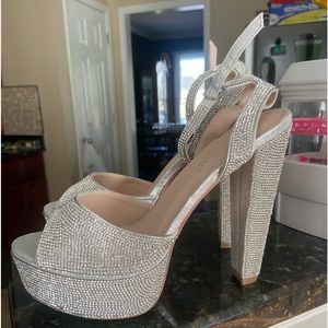 Size 9 silver De Blossom Pageant Heels worn once!! Great condition!!